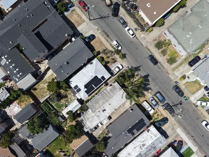 Drone photo looking straight down on a block of homes
